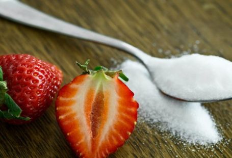 Sugar - Strawberry Beside Spoon of Sugar