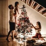 Holiday Traditions - Family Decorating Their Christmas Tree